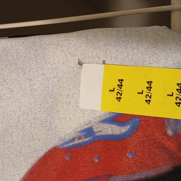 Black Graphic Tee with Red and Blue Helmet Design - Picture 3 of 3